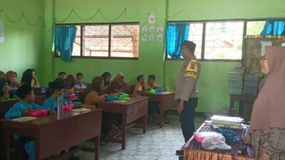 Polisi Kawal Program Makanan Bergizi Gratis di SDN 2 Ombe