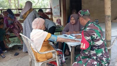 Babinsa dan Tenaga Kesehatan Bergandeng Tangan Wujudkan Posyandu Sehat di Pusuk Lestari