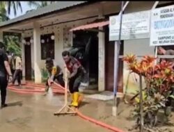 Dukungan Pendidikan Pulih Cepat Pascabanjir, Polres Pidie Jaya Bersihkan Sekolah MIN 1